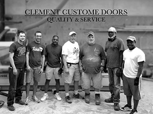 A group shot of the craftsmen of Clement Custom Doors.